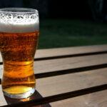 A Pale Ale Beer brewed on electric biab system sitting on picnic table