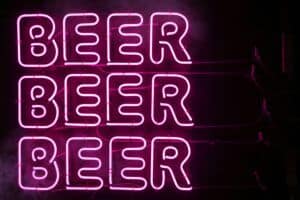 Neon sign with beer written 3 times